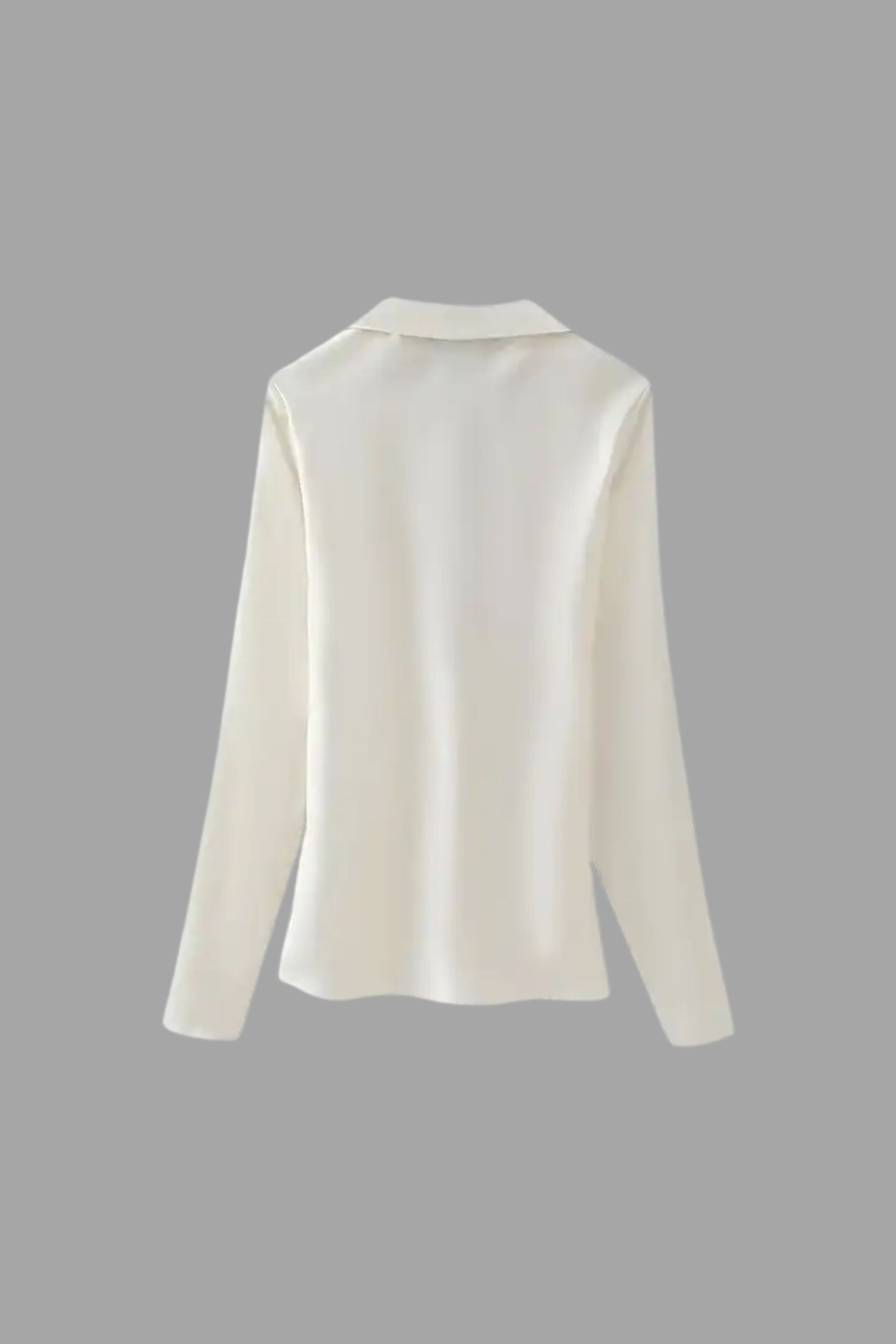 Kayla Top by Valera, highlighting its chic and simple design