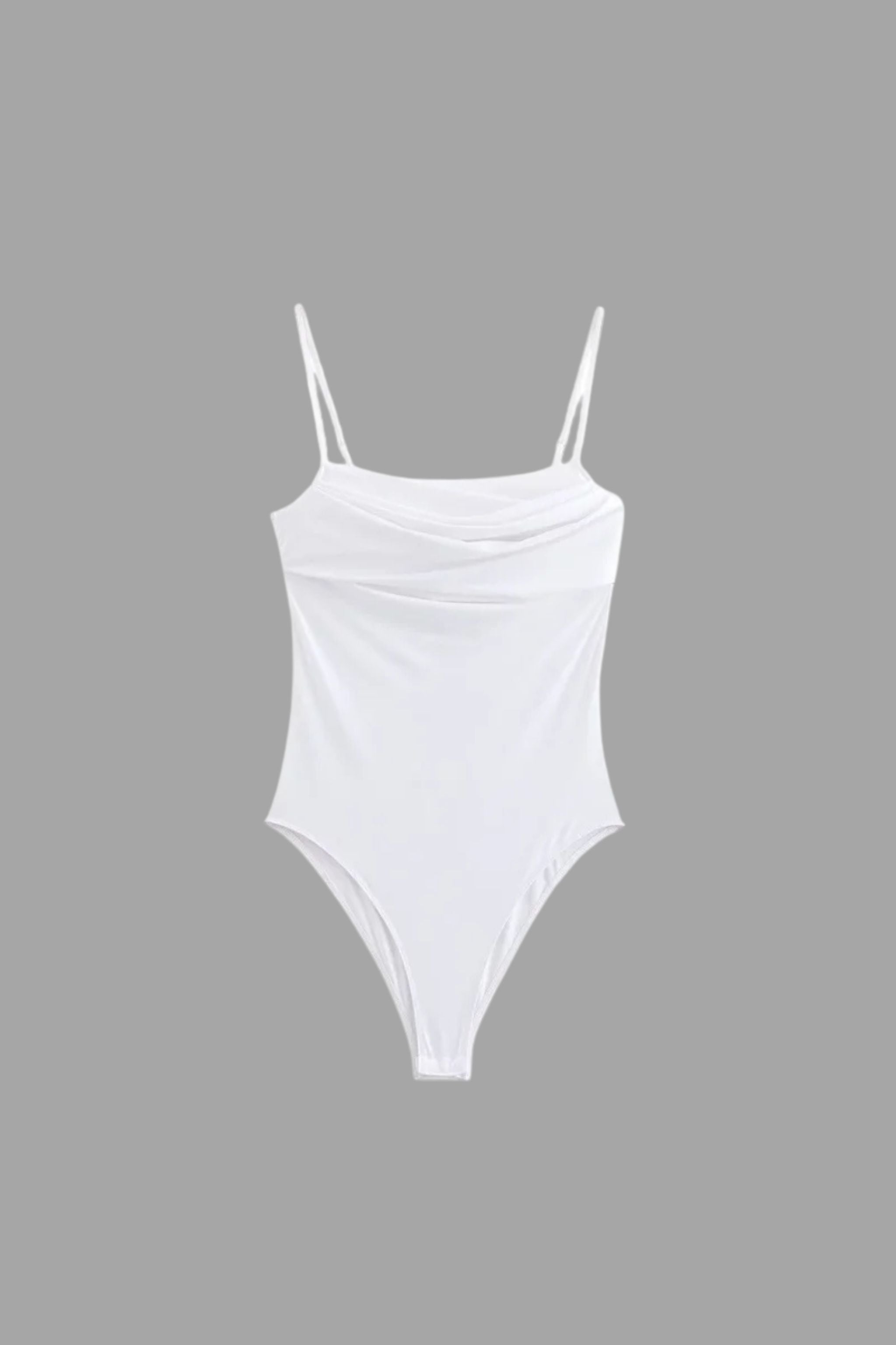 White Vela bodysuit, sleeveless design, sleek and elegant.